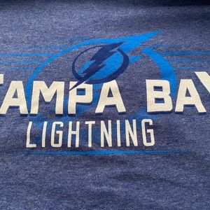 NHL blue t-shirt size Large, never worn, tags still on ..